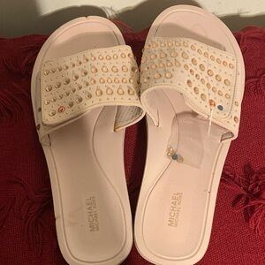Michael Kors light pink Studded slide .